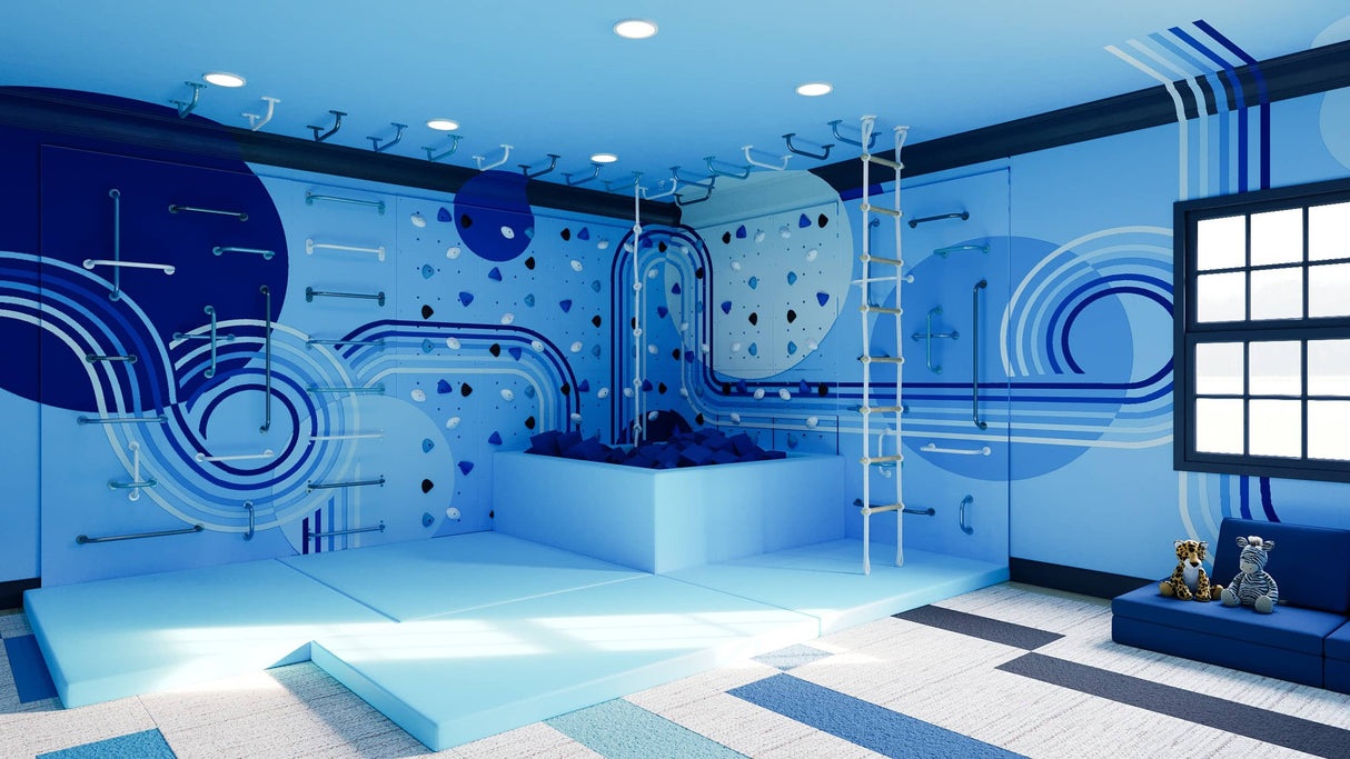 Large Out of the Blue climbing wall bundle with Back on Track mural, foam pit, and indoor play equipment for kids.