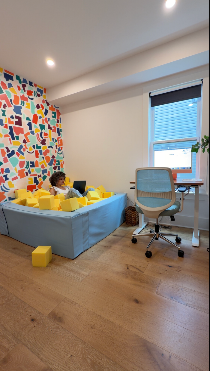 An adult in the foam pit