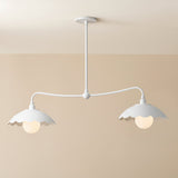 White pendant light with scalloped edges on a plain background