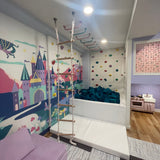 Children's room with colorful carpet, bunk bed, and patterned walls.