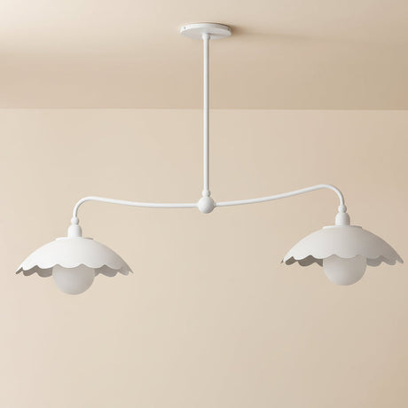 White pendant light with scalloped edges on a plain background