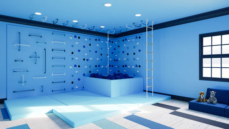 Large Out of the Blue indoor play bundle with full kids climbing wall, foam pit, and crash mats for active playroom.