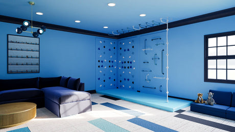 Small Out of the Blue climbing wall bundle with three wall panels, climbing holds, and crash pad for home playroom.