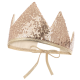 Sequined crown with a bow on a white background